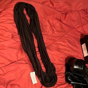 Black infinity scarf with a pocket. From Beyond Yoga